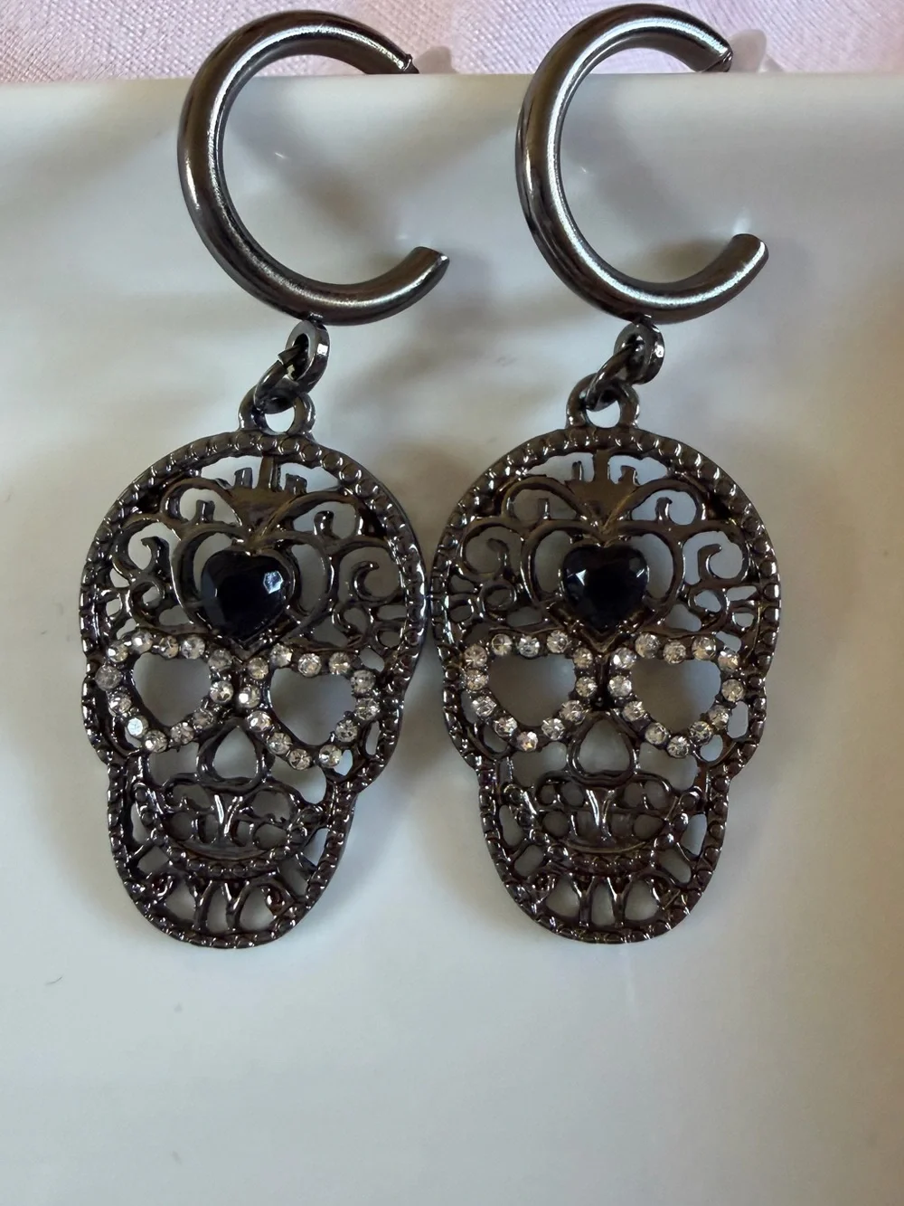 Gunmetal Filigree Skull Drop Earrings with Black Heart Accent
